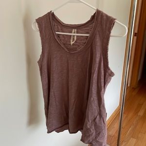 Anthropologie mauve colored sleeveless top. Raw hem at sleeves. Size small.